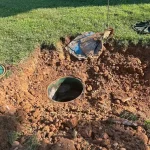 Close-up of a septic tank entry hole.